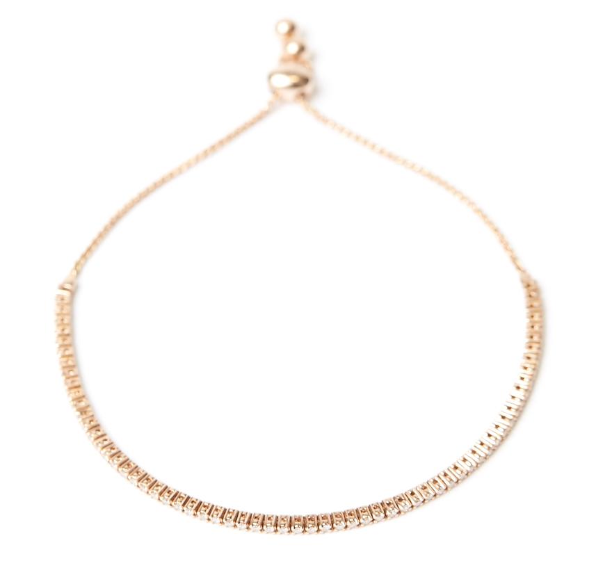 Diamond drawstring bracelet with adjustable length making it comfortable for everyday wear. 0.57 carats of diamonds and set in 14k (14 karat) yellow, rose or white gold.