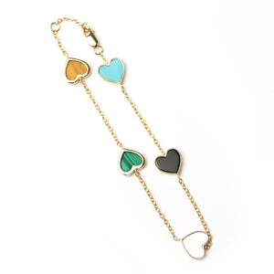 Five hearts bracelet with Turquoise, Onyx, Mother of Pearl, Malachite and Tigers Eye. Hand cut stones set in your choice of 14K gold.