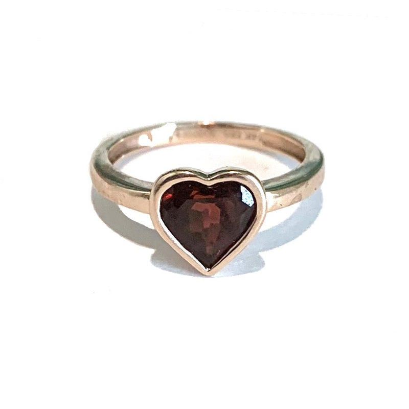 Garnet pinky ring in solid 14 karat gold