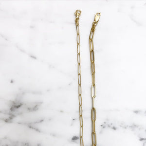 Comparison of Solid 14k gold paperclip bracelet with 2.6 millimeter elongated chain links and 3.85 millimeter elongated chain links